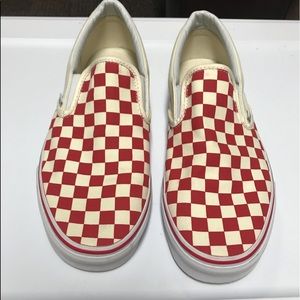 Red and white checkered slip on vans